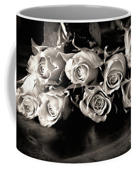 Roses Coffee Mug featuring the photograph Roses on a table in black and white by Simon Bratt
