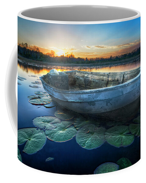 Boats Coffee Mug featuring the photograph Rowboat at Sunset by Debra and Dave Vanderlaan