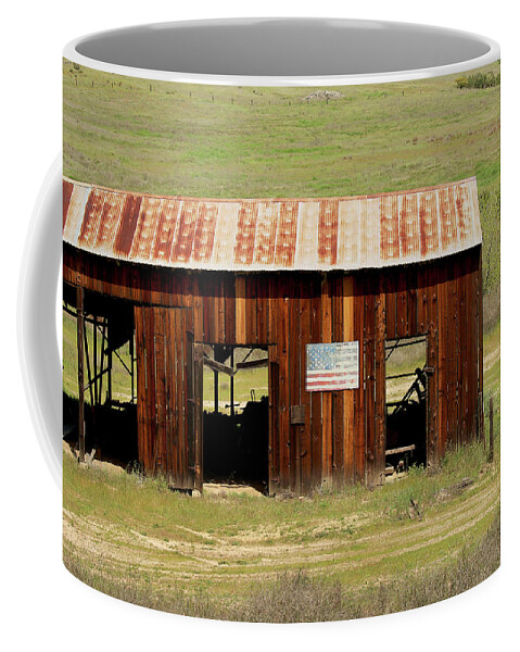 Soledad Coffee Mug featuring the photograph Rustic Barn with Flag by Art Block Collections