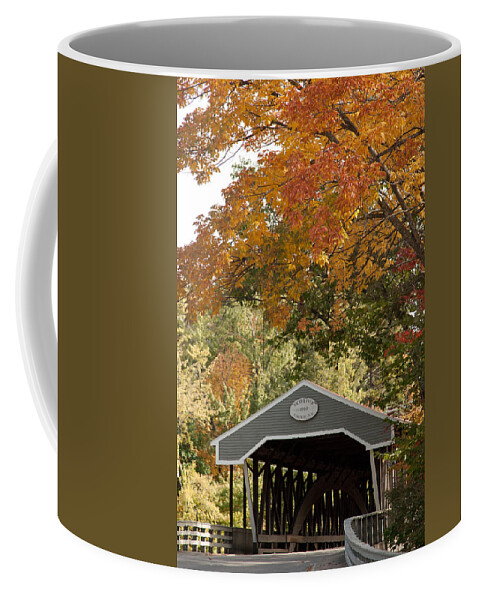  Coffee Mug featuring the photograph Saco river covered bridge under fall foliage by Jeff Folger