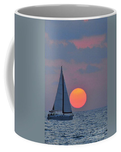 Sail Boats Coffee Mug featuring the photograph Sailboat at sunset by Shay Levy