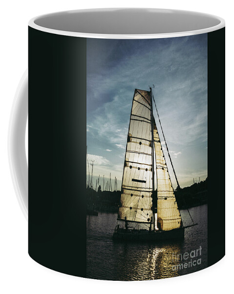Active Coffee Mug featuring the photograph Sailboat in Front of Sun in Harbor by Andreas Berthold