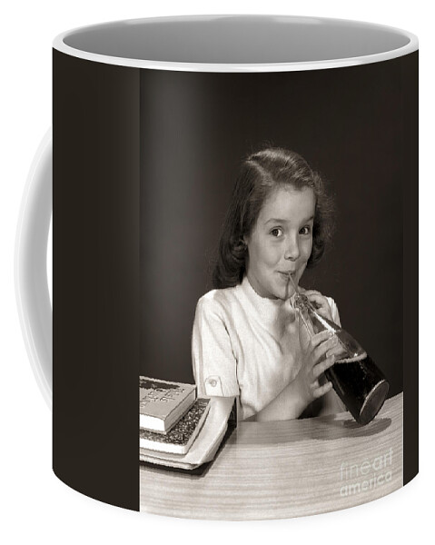 1950s Coffee Mug featuring the photograph Schoolgirl Drinking Soda, C.1950-60s by H. Armstrong Roberts/ClassicStock