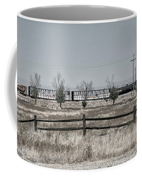 Desert Coffee Mug featuring the photograph Seven Trees and a train by Jessica Levant