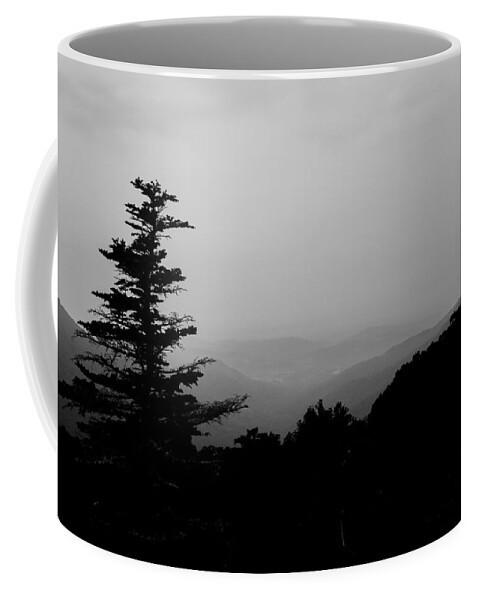 Kelly Hazel Coffee Mug featuring the photograph Silhouette of a Tree in the Mountains by Kelly Hazel