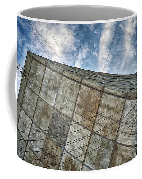 Architecture Coffee Mug featuring the photograph Sinking Building Sky of Dread by John Williams