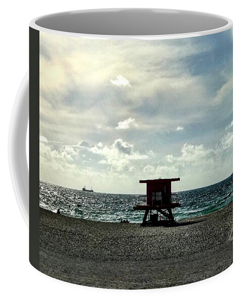South Beach Coffee Mug featuring the photograph Sitting on the Beach by Michael Albright