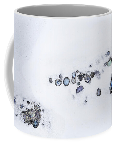 Theresa Tahara Coffee Mug featuring the photograph Snow Pebbles Left by Theresa Tahara