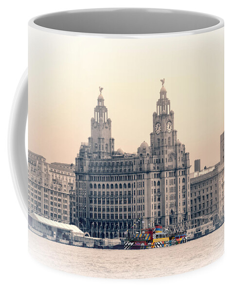 Pier Coffee Mug featuring the photograph Snowdrop Dazzles in front of the Liverbirds by Spikey Mouse Photography