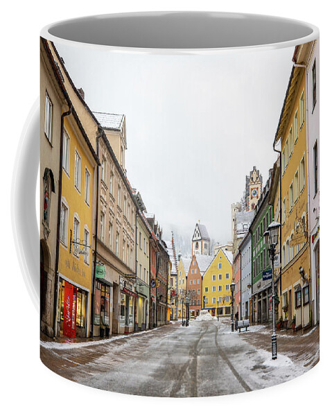 Photosbymch Coffee Mug featuring the photograph Snowy street in Fussen by M C Hood