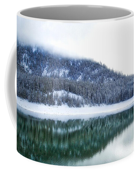 Snowy Trees On The Lake Coffee Mug featuring the photograph Snowy trees on the lake by Lynn Hopwood
