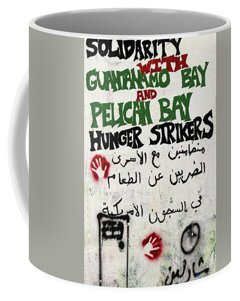 Solidarity Coffee Mug featuring the photograph Solidarity with Guantanamo Bay by Munir Alawi