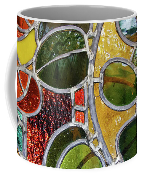 Stained Glass Coffee Mug featuring the photograph Stained Glass Wall Decor by Tatiana Travelways