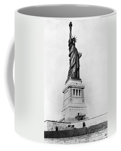1890 Coffee Mug featuring the photograph STATUE OF LIBERTY, c1890 by Granger