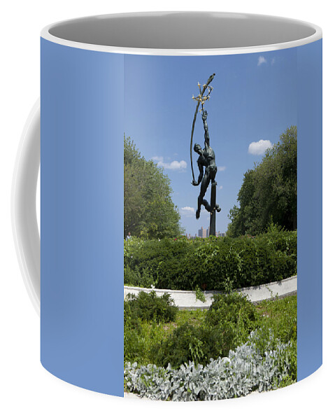  Americas Coffee Mug featuring the photograph Statue of Rocket Thrower in Flushing Meadows by Anthony Totah