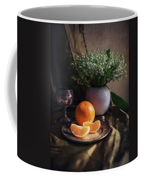 Basket Coffee Mug featuring the photograph Still life with fresh flowers and tangerines by Jaroslaw Blaminsky