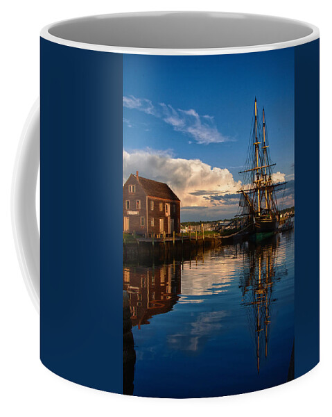 Salem Coffee Mug featuring the photograph Storm leaves reflection on Salem by Jeff Folger