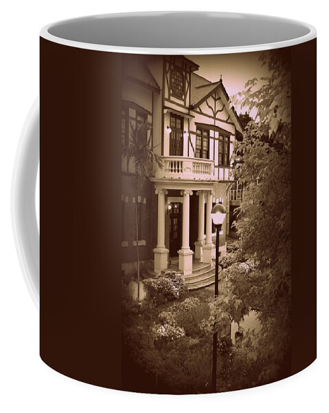 Taipei Coffee Mug featuring the photograph Story House by Bill Hamilton