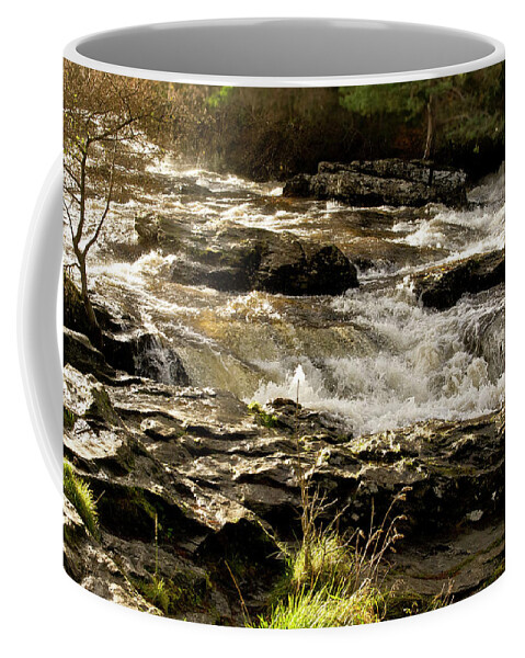 Sun Coffee Mug featuring the photograph Sun over rushing falls. Dochart. by Elena Perelman