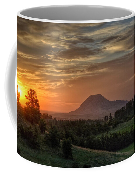 Bear_butte Coffee Mug featuring the photograph Sunrise Serenity by Fiskr Larsen