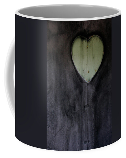 Heart Coffee Mug featuring the photograph Surviving Heart After the Fire by John Harmon