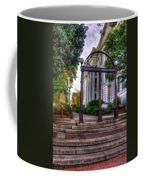 https://render.fineartamerica.com/images/rendered/default/frontright/mug/images/artworkimages/medium/1/the-arch-5-university-of-georgia-arch-art-reid-callaway.jpg?&targetx=289&targety=0&imagewidth=221&imageheight=333&modelwidth=800&modelheight=333&backgroundcolor=1C1F12&orientation=0&producttype=coffeemug-11