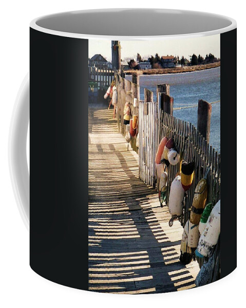 Buoy Coffee Mug featuring the photograph The buoy fence by John Scates