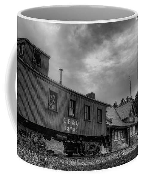 Railroad Coffee Mug featuring the photograph The Depot Under Cloudy Skies Black and White by Dale Kauzlaric
