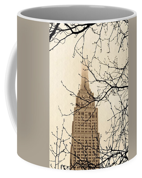 Empire State Building Coffee Mug featuring the photograph The Empire State Building on a Foggy Afternoon by Sarah Loft