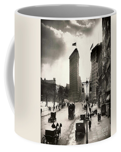 Times Square Coffee Mug featuring the photograph The Flatiron Building by Jon Neidert