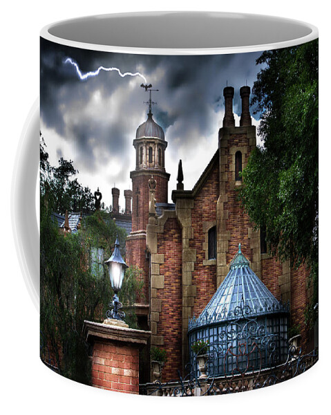 Disney Coffee Mug featuring the photograph The Haunted Mansion by Mark Andrew Thomas