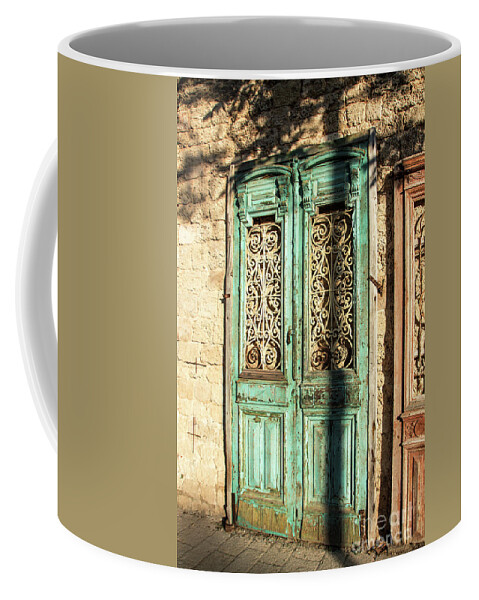 Old Coffee Mug featuring the photograph The old green door by Adriana Zoon