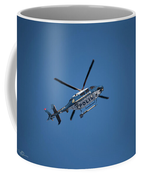 Swedish Police Helicopter Coffee Mug featuring the photograph The searcher in the air by Torbjorn Swenelius
