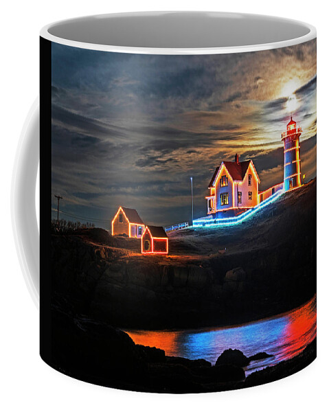 Nubble Coffee Mug featuring the photograph The supermoon rising over the Nubble Lighthouse York Maine Reflection by Toby McGuire