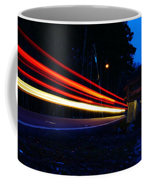 Light Trail Coffee Mug featuring the photograph The Trail To... by Nicole Lloyd