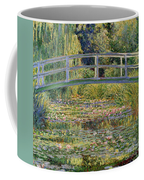 The Coffee Mug featuring the painting The Waterlily Pond with the Japanese Bridge by Claude Monet