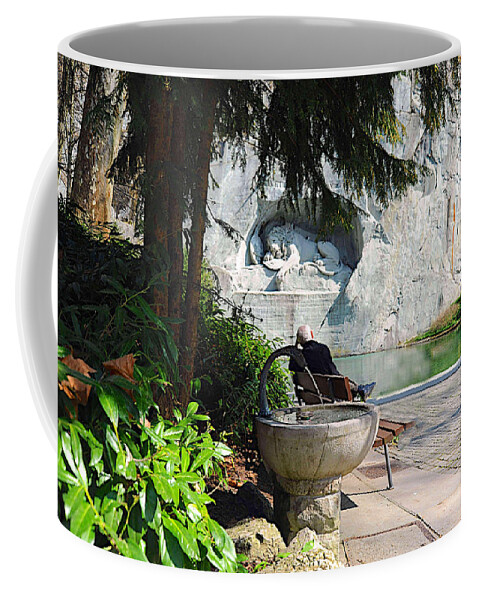 Photograph Coffee Mug featuring the photograph The Wounded Lion by Richard Gehlbach