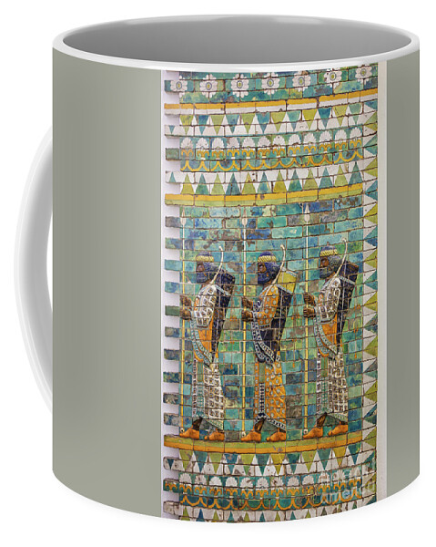 Babil Coffee Mug featuring the photograph Three warriors on ancient wall from Babylon by Patricia Hofmeester