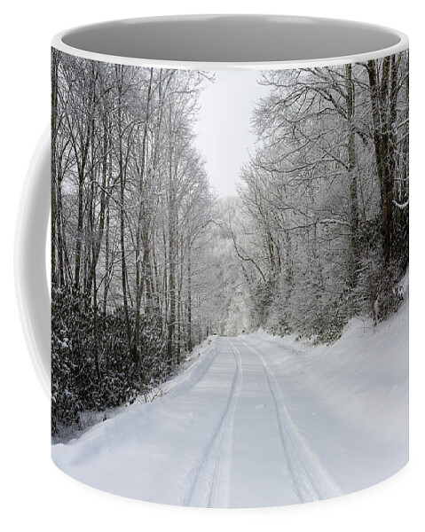 Snow Coffee Mug featuring the photograph Tire Tracks In Fresh Snow by D K Wall
