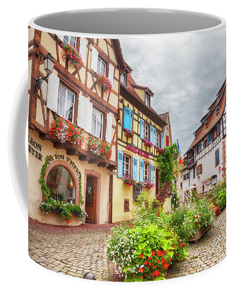 Alsace Coffee Mug featuring the photograph town square in Alsace village Eguisheim in Strasbourg region by Ariadna De Raadt