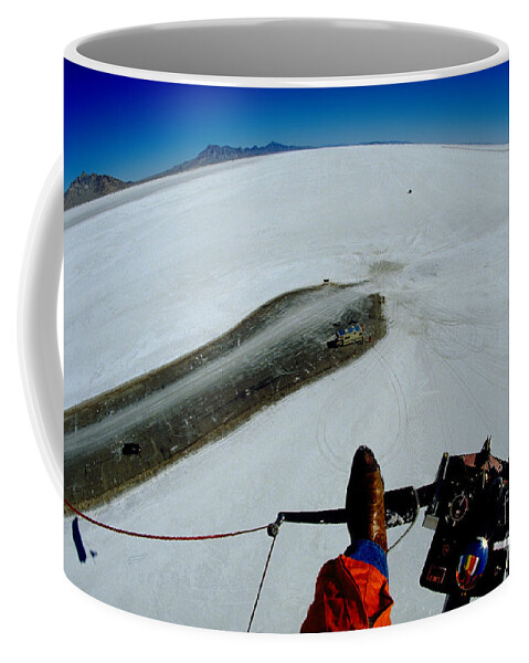 Boots Coffee Mug featuring the photograph Ultralight Aircraft flying over the Bonneville Salt Flats by Wernher Krutein