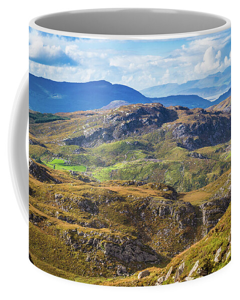 Blue Coffee Mug featuring the photograph Undulating landscape in Kerry in Ireland by Semmick Photo