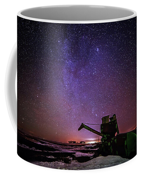 Astroscape Skyscape Night Stars Milky Way Landscape Starscape Combine Harvester Nd Snow Winter Orion North Dakota Cold Purple Green John Deere Coffee Mug featuring the photograph Waiting for Next Harvest by Peter Herman