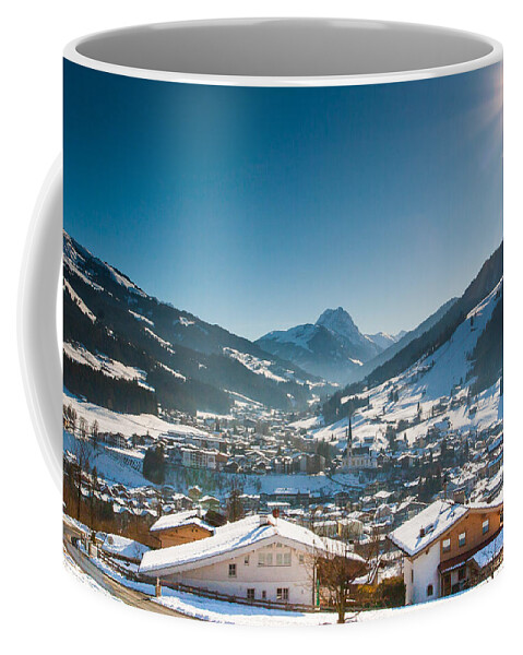 Austria Coffee Mug featuring the photograph Warm winter day in Kirchberg town of Austria by John Wadleigh