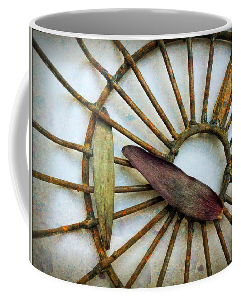 Wheel Coffee Mug featuring the photograph Wheel and Leaves by Peggy Dietz