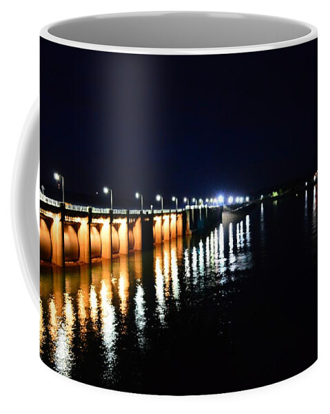 Nighttime Coffee Mug featuring the photograph Wolf Creek Dam Nightlights Reflection by Stacie Siemsen