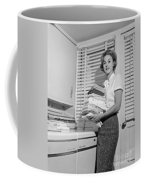 1960s Coffee Mug featuring the photograph Woman Doing Laundry, C.1960s by H. Armstrong Roberts/ClassicStock