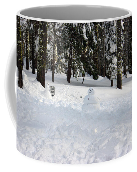 Snowman Coffee Mug featuring the photograph Wrong way snowman by Christine Jepsen