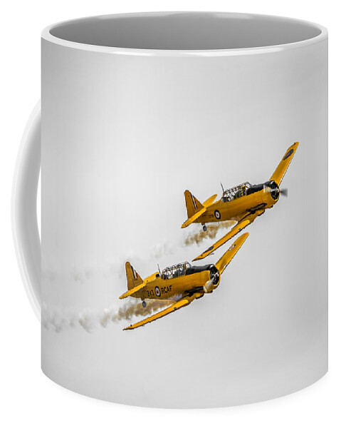 Airport Coffee Mug featuring the photograph Yellow Thunder Harvard Team by Bill Cubitt
