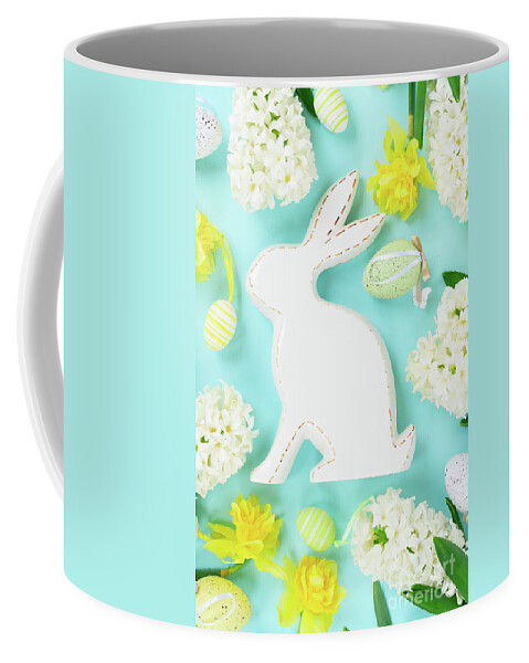 Easter Coffee Mug featuring the photograph Easter scene with colored eggs #1 by Anastasy Yarmolovich